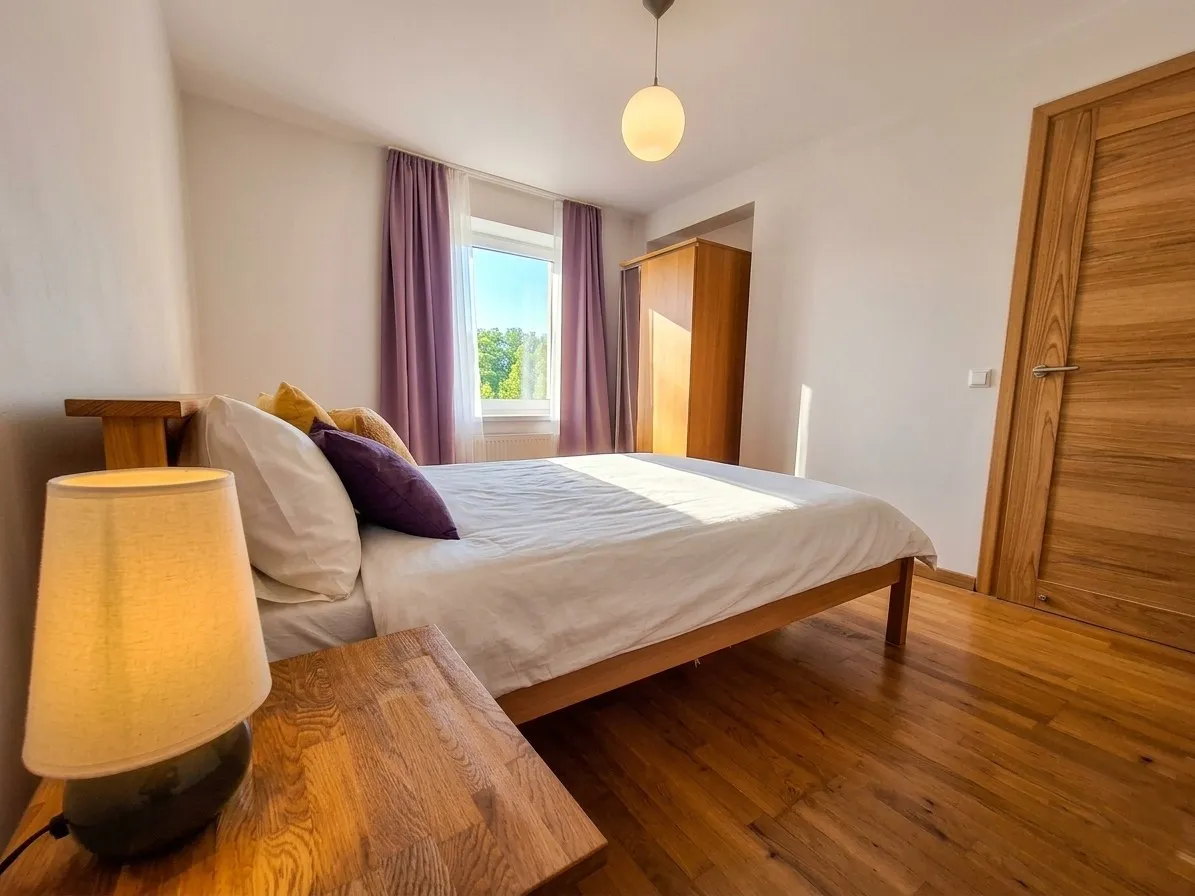 Bedroom with a double bed and a wardrobe
